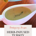 Herb-infused turkey gravy on a gravy boat, by enrilemoine.