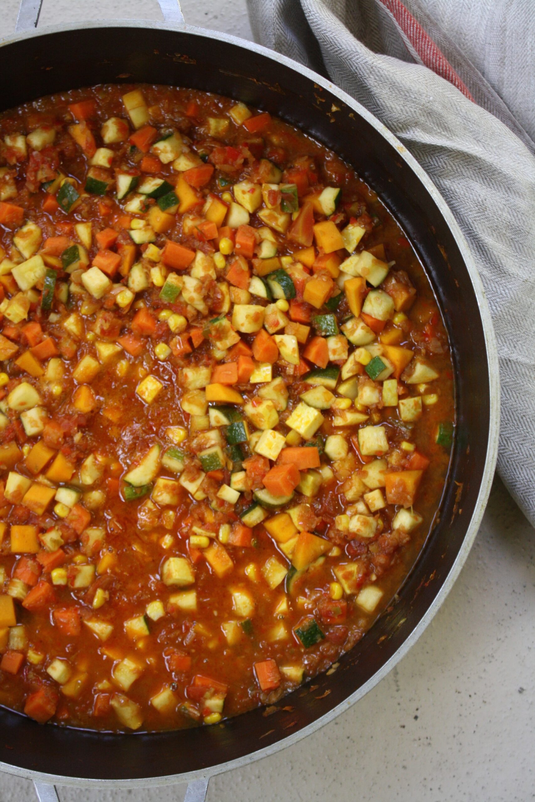 Vegetarian hallaca stew in a big cauldron.