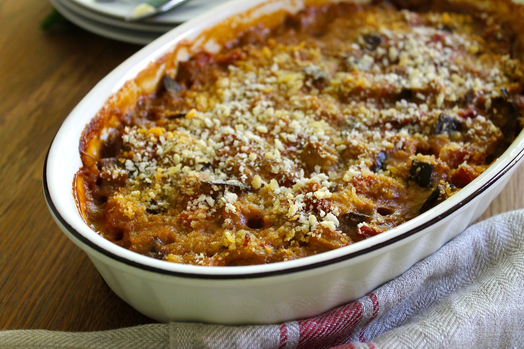 gratín de berenjenas y tomates con anchoas