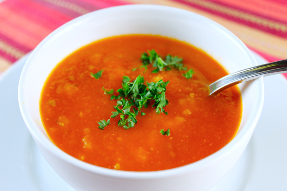 tomato and rosemary soup, garnished with fresh parsley
