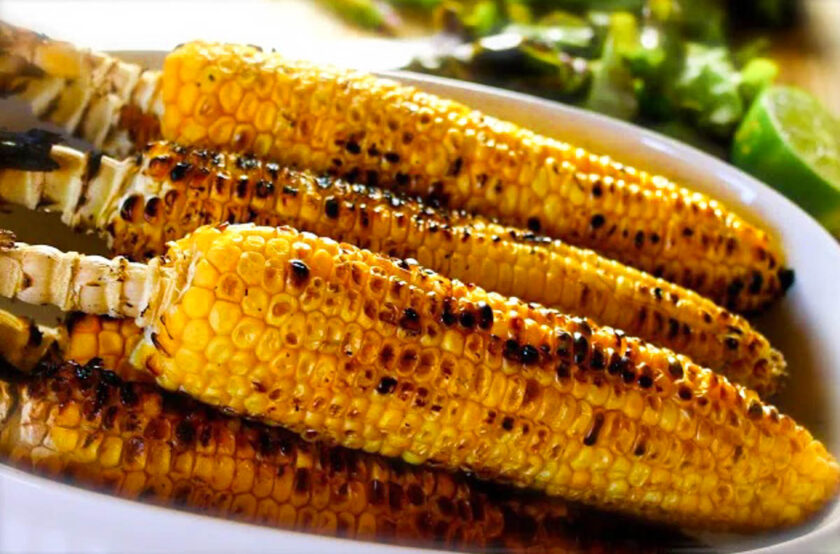 Grilled corn on the cob with jalapeño cheddar cornbread muffins.