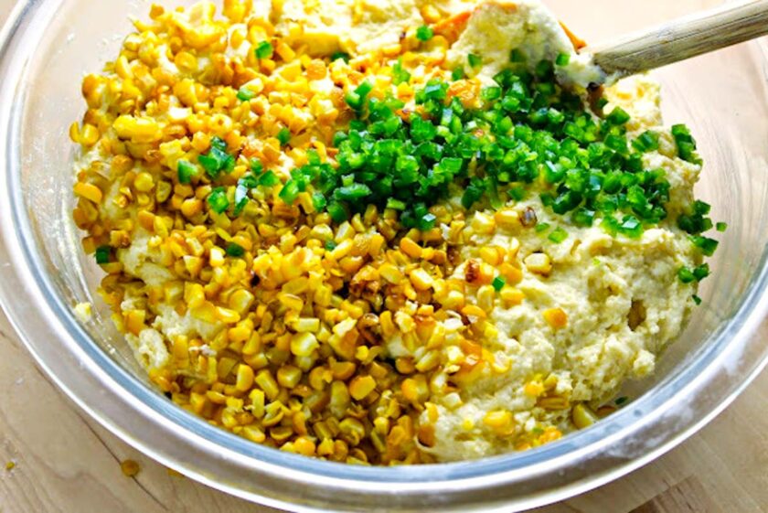A bowl of cronbread batter with grilled corn and jalapeños, by enrilemoine.