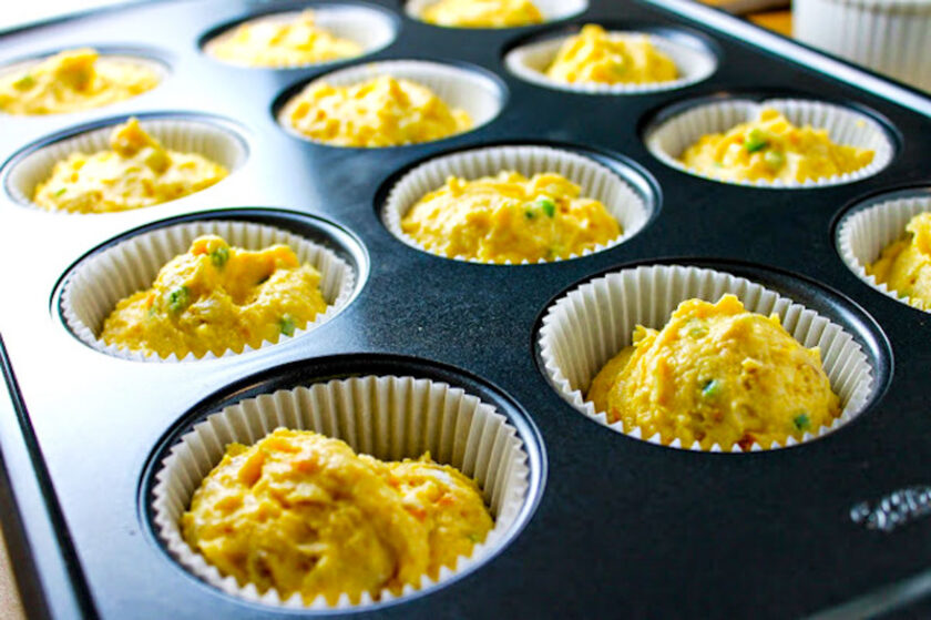 Grilled Corn Jalapeño Cheddar Cornbread Muffins in a muffin tin before getting into the oven, by enrilemoine.