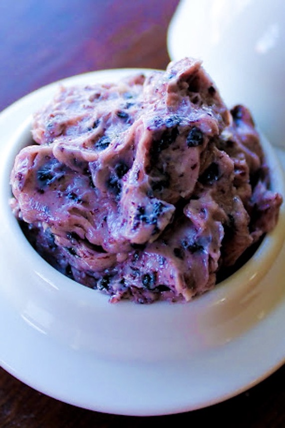A bowl of blueberry ice cream.