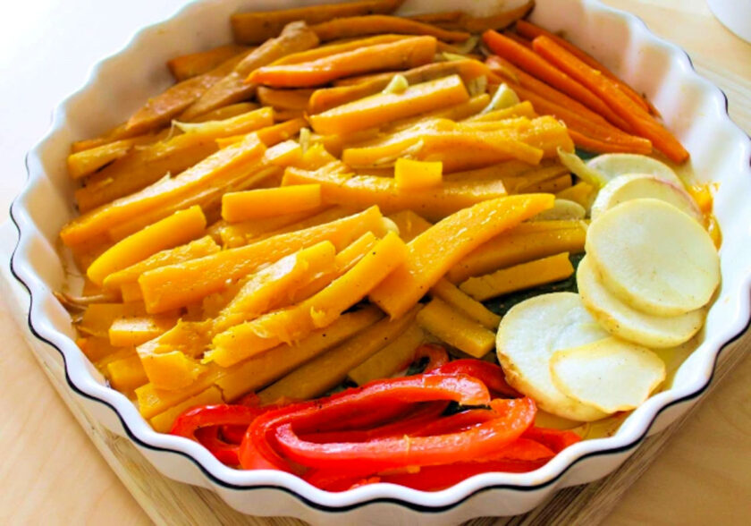 A white dish with roasted veggies on it, by enrilemoine.