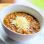 A bowl of Italian Style lentil Soup with Parmesan Cheese.