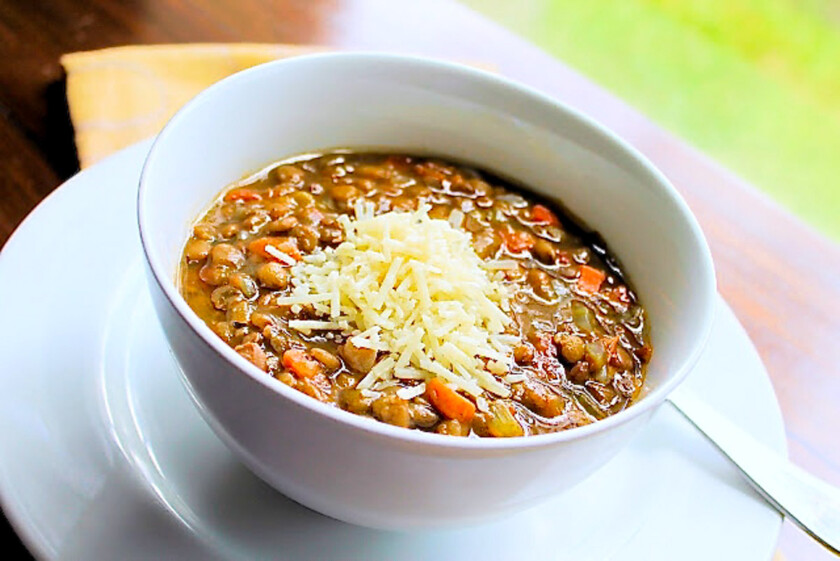 A bowl of Italian Style lentil Soup with Parmesan Cheese.