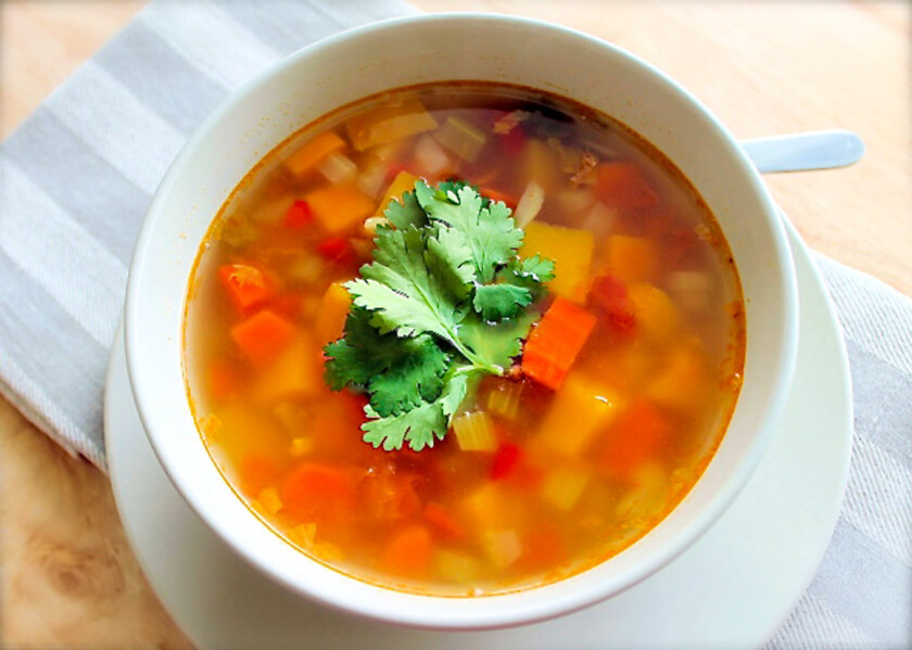 Venezuelan seven veggie soup garnished with cilantro.