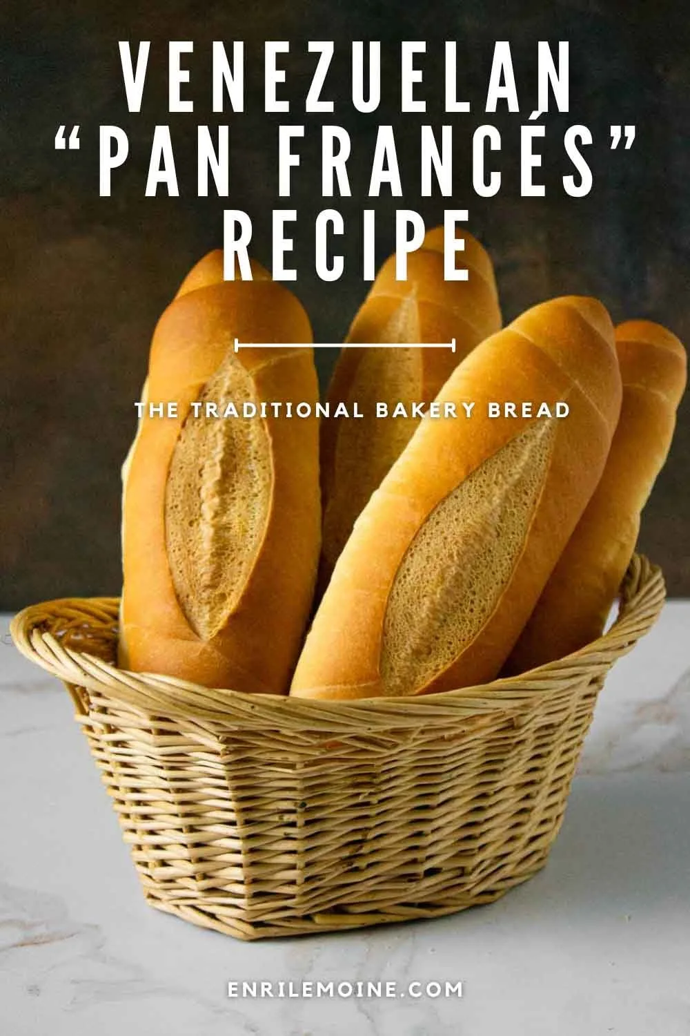 Four pan francés rolls in a basket with the text "Venezuelan pan fracés recipe" above.