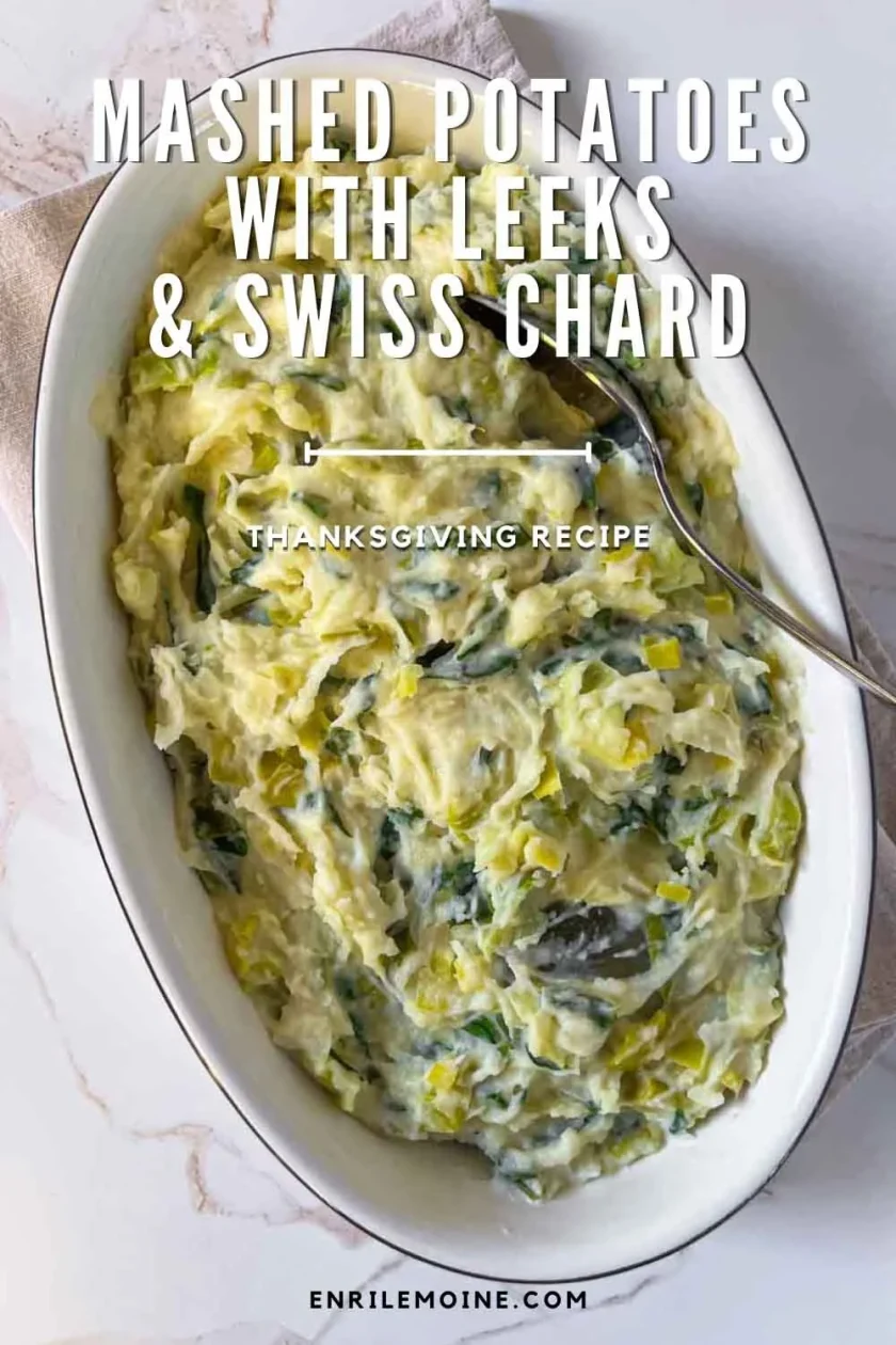 Oval dish of mashed potatoes with leek and chard served with a spoon, labeled as a Thanksgiving recipe.