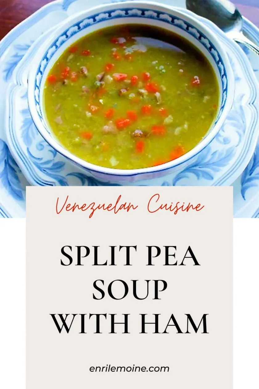 Split pea soup with han and carrtos in a white and blue bowl.