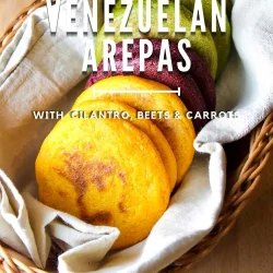 Veggie colored venezuelan arepas in a linen beige towel, o ver a basket.