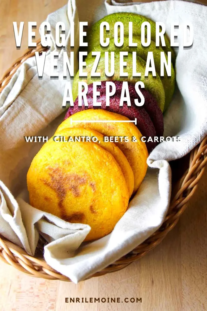 Veggie colored venezuelan arepas in a linen beige towel, o ver a basket.