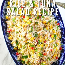 A blue patterned dish filled with Venezuelan rice and tuna salad, garnished with corn, peppers, and herbs; text overlay reads "Venezuelan Rice & Tuna Salad Recipe.