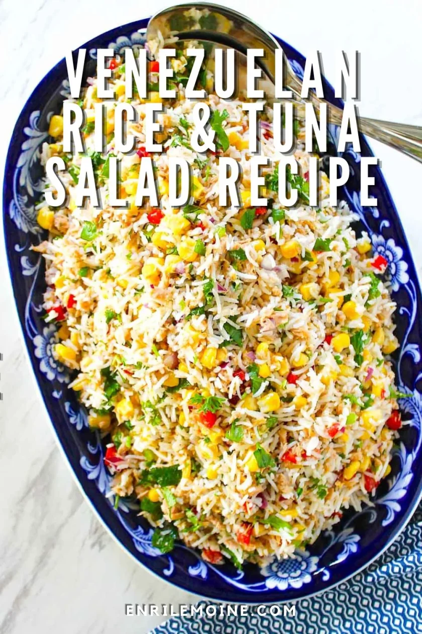 A blue patterned dish filled with Venezuelan rice and tuna salad, garnished with corn, peppers, and herbs; text overlay reads "Venezuelan Rice & Tuna Salad Recipe.
