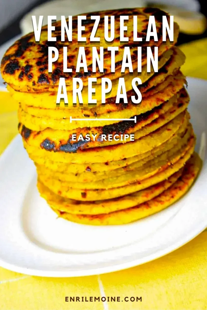 A stack of golden Venezuelan plantain arepas sits on a white plate, with text overlay reading "Venezuelan Plantain Arepas, Easy Recipe.