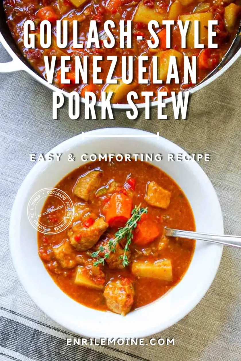 A white bowl of Venezuelan pork stew with carrots and herbs, next to a Dutch oven filled with more stew. The text overlay describes it as goulash-style, easy to make, and comforting.